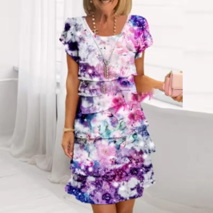 Robe femme fleurie à volants fluide col rond manches courtes été élégante
