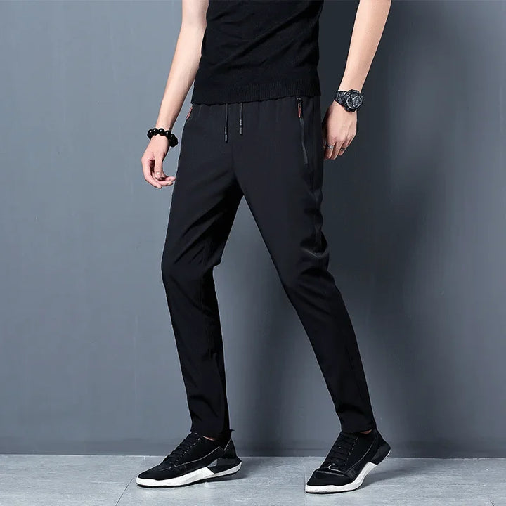 Pantalon homme décontracté taille élastique avec poches zippées