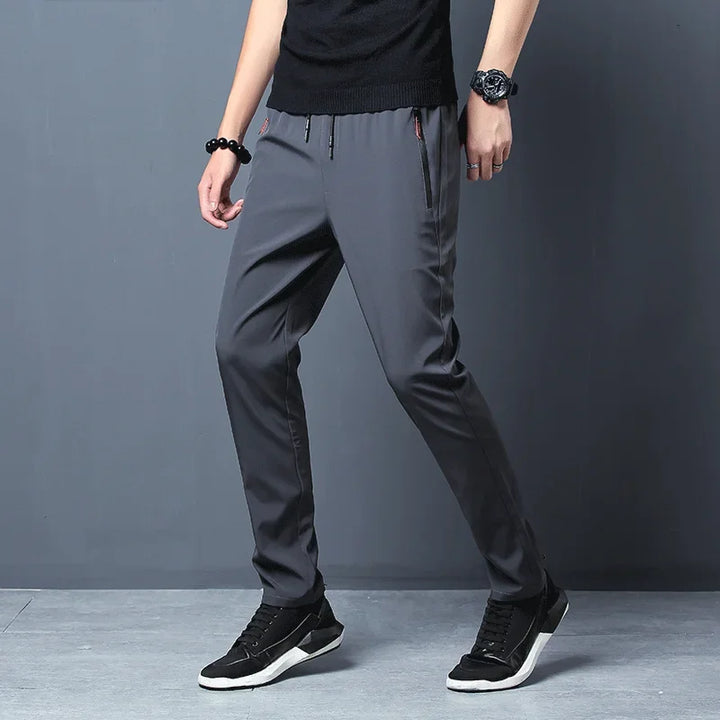 Pantalon homme décontracté taille élastique avec poches zippées