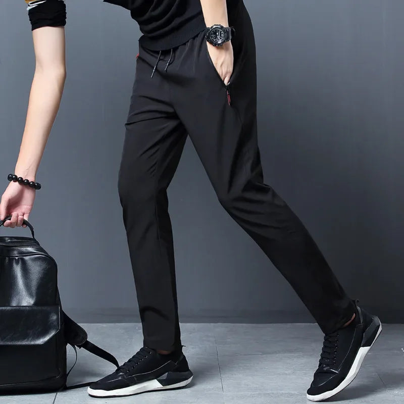 Pantalon homme décontracté taille élastique avec poches zippées