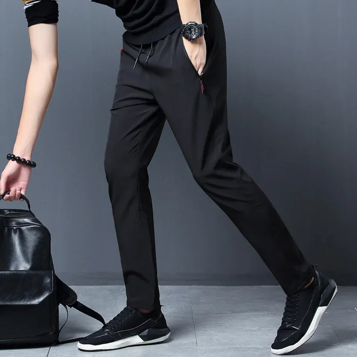 Pantalon homme décontracté taille élastique avec poches zippées