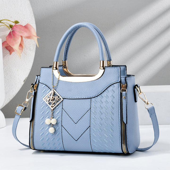 Sac à main femme matelassé avec bandoulière ajustable