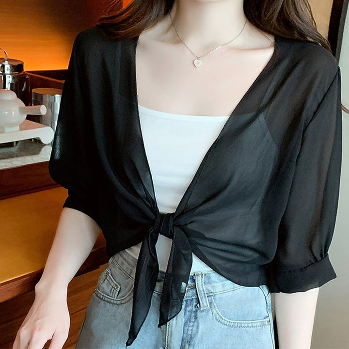 Haut femme en chiffon transparent avec nœud à l’avant