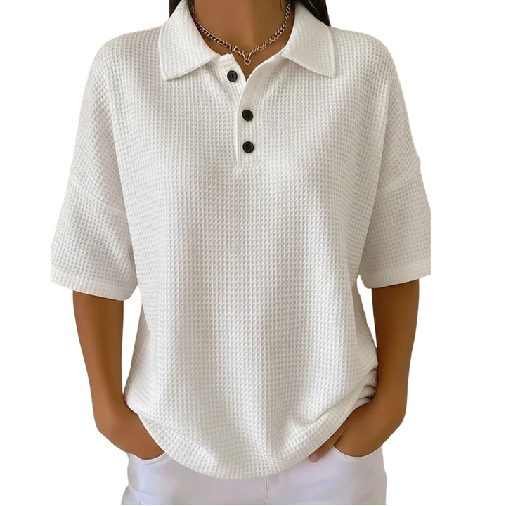 Polo femme texturé à col classique et boutons
